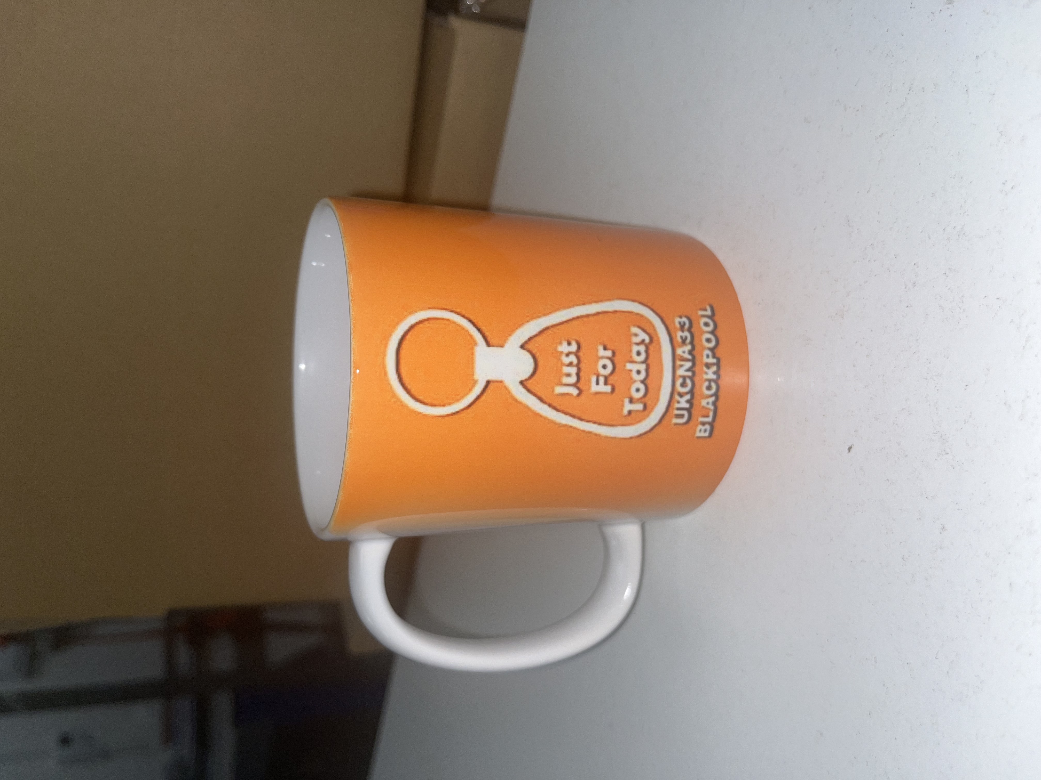 UKCNA33 Orange Mug